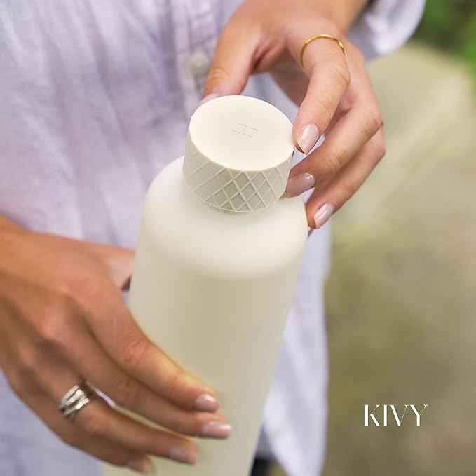 KIVY Tritan Water Bottle with removable sleeve - 22 oz Water Bottle screw top - Reusable water bottle no straw - Aesthetic water bottle - Black bottle for men - Dishwasher safe