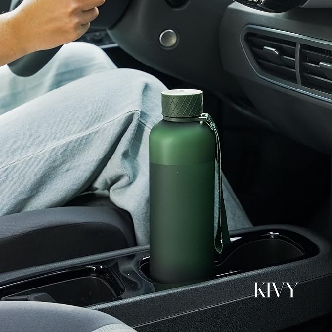 KIVY Slim Water Bottle 32oz [Lightweight & Shatterproof] Fits Backpack & Cupholder for Travel, Sports, School, Gym - Clear water bottle with measurements - Transparent Tritan Beige - Dishwasher Safe